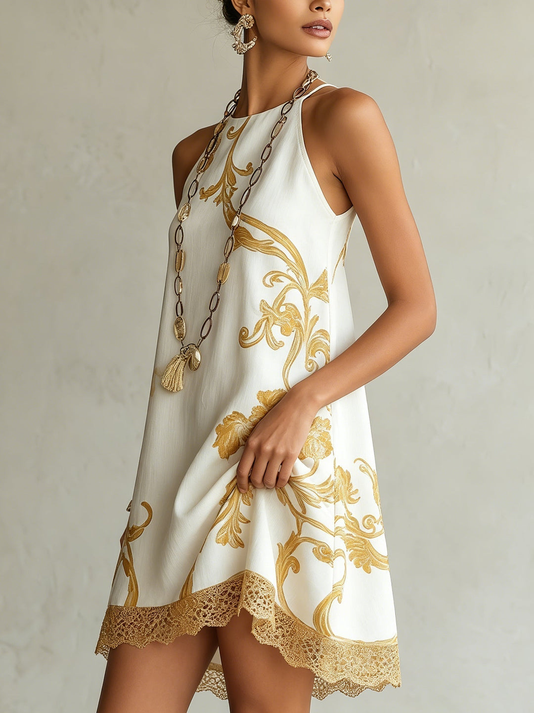 Leokádia | Elegant White Mini Dress Featuring Gold Floral Design