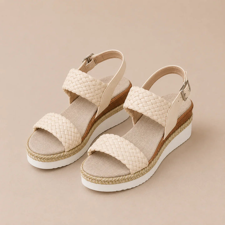 Elegant platform sandals with woven detail and espadrille sole
