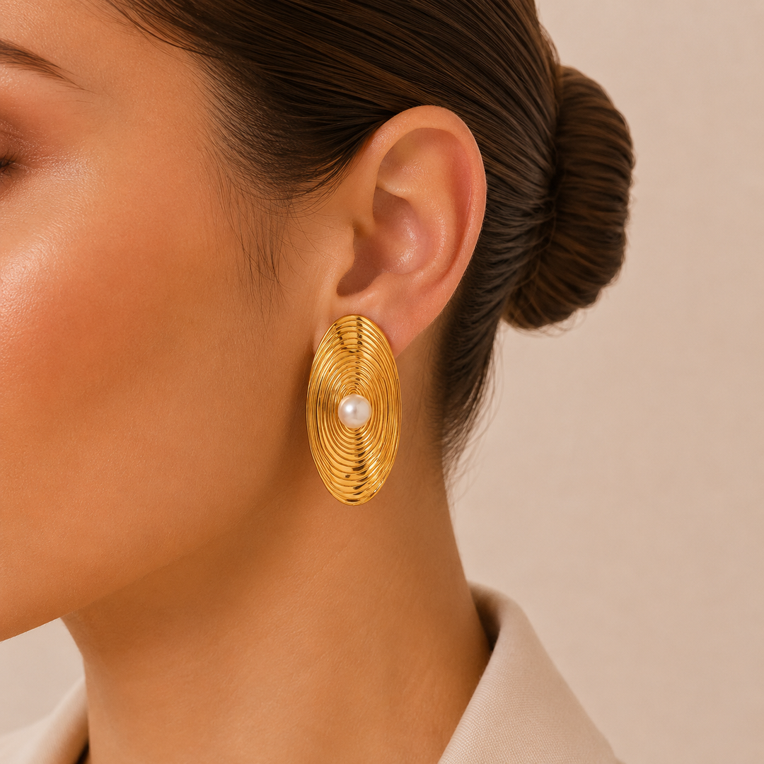 Gold Oval Earrings with Spiral Design and Central Pearl