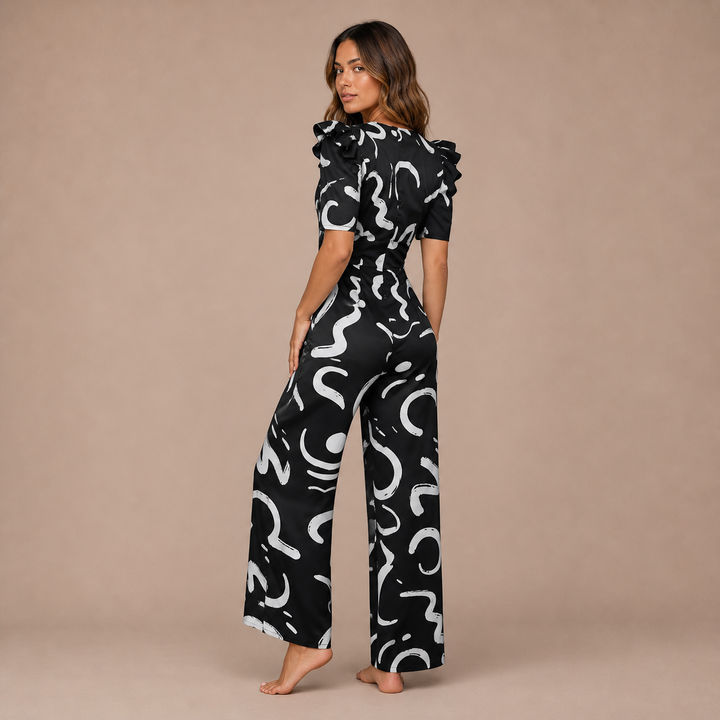 Lara – Contemporary jumpsuit with print and V neckline