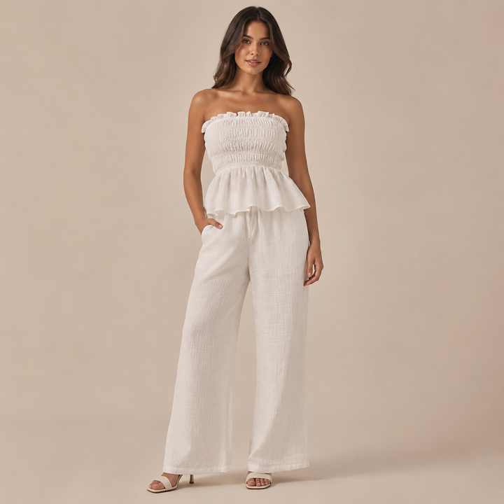 Nouria - Strapless top with peplum skirt and palazzo trousers in linen