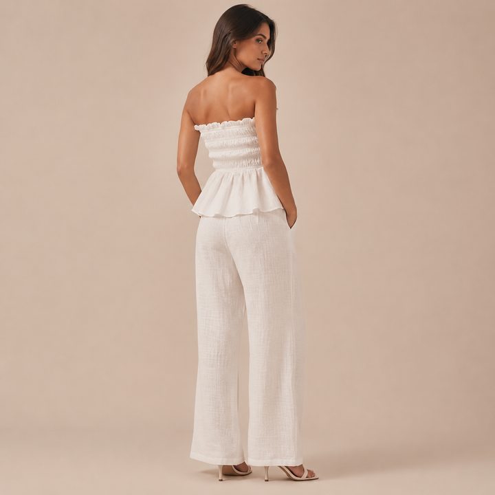 Nouria - Strapless top with peplum skirt and palazzo trousers in linen
