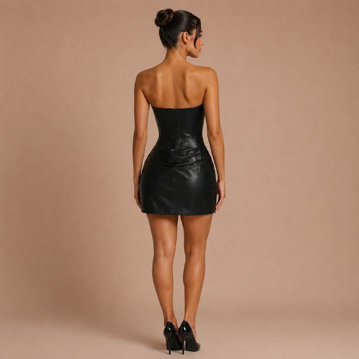 Beatriz - Mini strapless leather dress with corset and pleated skirt