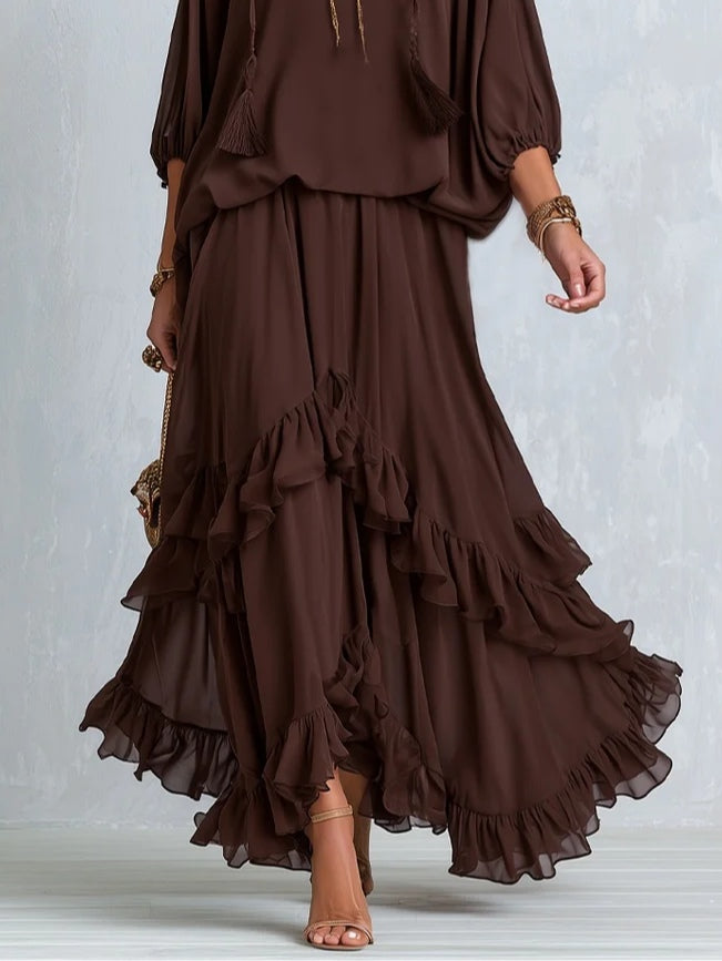 Brown Ensemble Featuring a Frilled Skirt and Tassel Top
