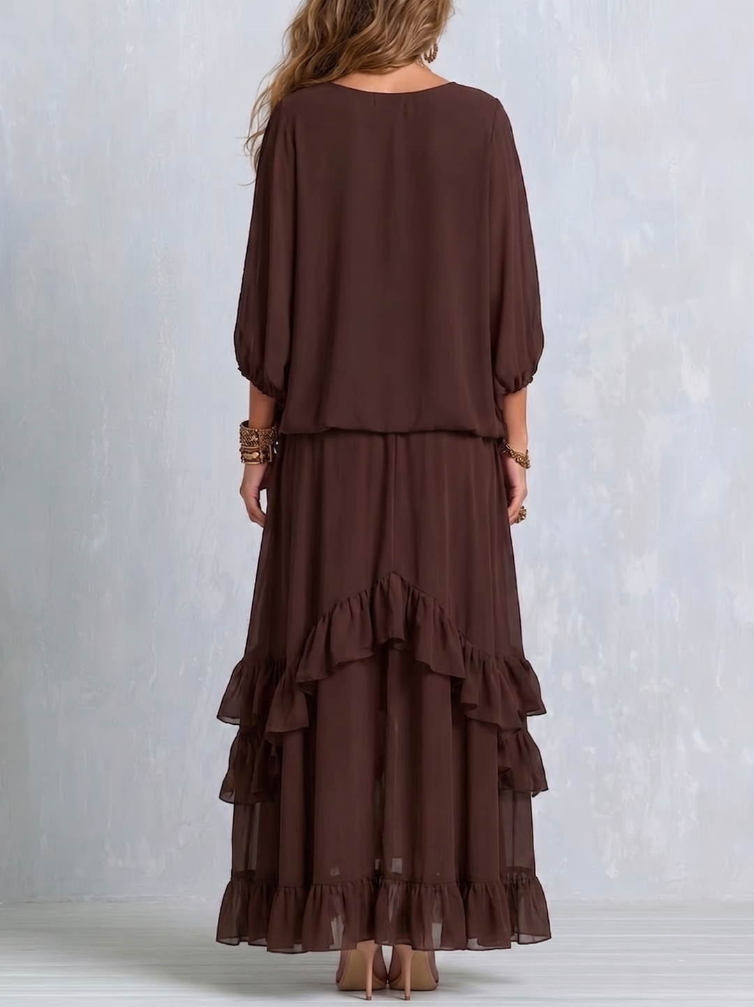 Brown Ensemble Featuring a Frilled Skirt and Tassel Top