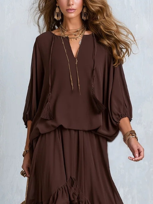 Brown Ensemble Featuring a Frilled Skirt and Tassel Top