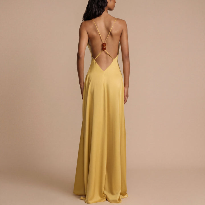 Noa – Long dress with a striking neckline and flowing silhouette